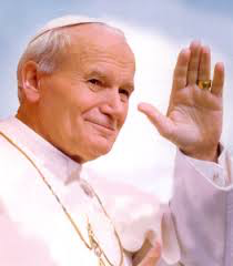 Pope John Paul II offering a blessing